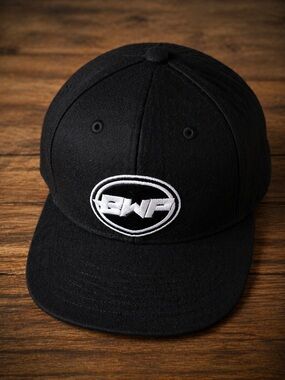 The Classic Felt Black Snapback Hat with White Embroidered Logo